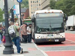 THE CONNECTION: Passengers board an R.I. Public Transit Authority bus recently at Kennedy Plaza in Providence. PBN PHOTO/CHRISTOPHER ALLEN