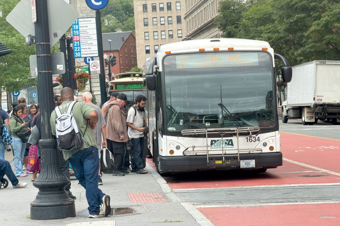 THE CONNECTION: Passengers board an R.I. Public Transit Authority bus recently at Kennedy Plaza in Providence.
PBN PHOTO/CHRISTOPHER ALLEN THE CONNECTION: Passengers board an R.I. Public Transit Authority bus recently at Kennedy Plaza in Providence.
PBN PHOTO/CHRISTOPHER ALLEN