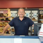 RICH TRADITION: David Grande, owner of Savon Shoes, at the company’s North Providence location. Grande bought Jamiels Shoe World in 2013.  PBN PHOTO/ STEPHANIE BERNABA