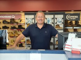 RICH TRADITION: David Grande, owner of Savon Shoes, at the company’s North Providence location. Grande bought Jamiels Shoe World in 2013.  PBN PHOTO/ STEPHANIE BERNABA