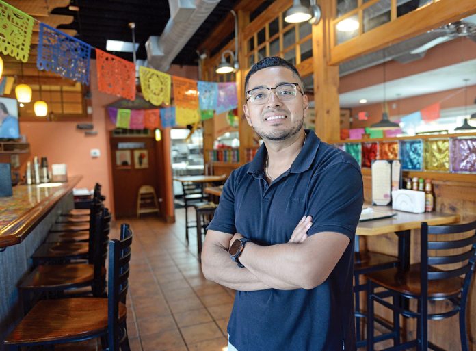 TAKING OVER: Henry ­Lopez-Melgar, a longtime team member who spent much of his career working his way up from washing dishes and preparing food to management responsibilities at Tito’s Cantina in Middletown, is now the restaurant’s new owner.   PBN PHOTO/­ELIZABETH GRAHAM