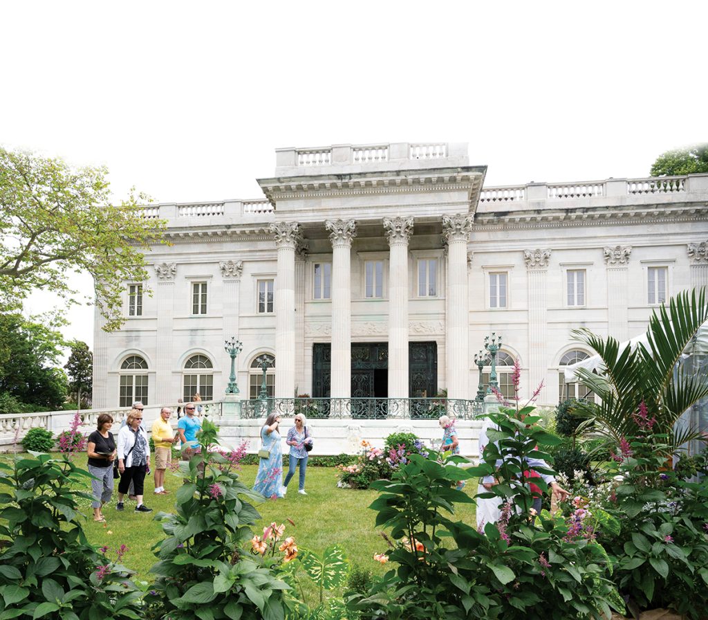VISITORS STROLL the grounds at Marble House during a previous summer. Some tourism officials say its too easy to say how successful the 2026 high season has been. / PBN FILE PHOTO/DAVID HANSEN