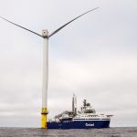 Offshore wind sector hits turbulence BACK AT IT:
An Orsted A/S vessel is docked to one of the massive wind turbines off the coast of Rhode Island. Work on the turbines was delayed because of Trump administration orders, but it has resumed after the courts stepped in.
AP FILE PHOTO/JOSHUA A. BICKEL