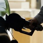 THE AVERAGE weekly price of self-serve, regular unleaded gasoline in Rhode Island decreased 11 cents to $3.96 per gallon, AAA Northeast said Tuesday. / AP FILE PHOTO/NAM Y. HUH