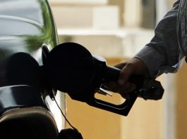 THE AVERAGE weekly price of self-serve, regular unleaded gasoline in Rhode Island decreased 11 cents to $3.96 per gallon, AAA Northeast said Tuesday. / AP FILE PHOTO/NAM Y. HUH