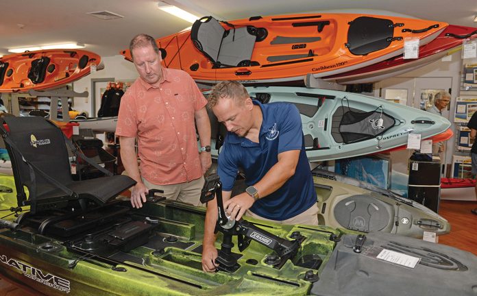 BETTER THAN MOST: Matt Bosgraaf, right, owner of the Kayak Centre in North Kingstown, says inflation and other economic challenges have not stopped his business from growing.
PBN FILE PHOTO/ELIZABETH GRAHAM BETTER THAN MOST: Matt Bosgraaf, right, owner of the Kayak Centre in North Kingstown, says inflation and other economic challenges have not stopped his business from growing.
PBN FILE PHOTO/ELIZABETH GRAHAM