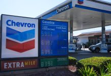 DIESEL AND GAS prices are displayed at a Chevron gas station in Brea, Calif. The average weekly price of self-serve, regular unleaded gasoline in Rhode Island increased 12 cents in the last week to $4.37 per gallon, AAA Northeast said Monday. / AP PHOTO/JAE C. HONG