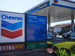 DIESEL AND GAS prices are displayed at a Chevron gas station in Brea, Calif. The average weekly price of self-serve, regular unleaded gasoline in Rhode Island increased 12 cents in the last week to $4.37 per gallon, AAA Northeast said Monday. / AP PHOTO/JAE C. HONG