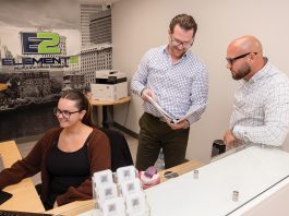 CONSISTENT PROGRESS: From left, Marilyn McKay, Patrick Madden and Rocco Giusti of Element2 Consulting Group, whose growth rests on consistency, not transactions. PBN PHOTO/TRACY JENKINS