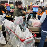 Inflation cooled slightly in August even as consumers stepped up spending