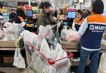 Inflation cooled slightly in August even as consumers stepped up spending