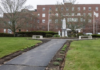NEW PLAN? Questions remain about the five-year strategic plan for Our Lady of Fatima Hospital, pictured above, and Roger Williams Medical Center. / PBN FILE PHOTO/MICHAEL SALERNO