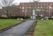 NEW PLAN? Questions remain about the five-year strategic plan for Our Lady of Fatima Hospital, pictured above, and Roger Williams Medical Center. / PBN FILE PHOTO/MICHAEL SALERNO