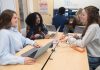 Media marketing: From left, students Madi Siedliski, Nyjaeh Deburgo and Rebecca Minichino discuss a marketing strategy while interning at the Social Media Agency program at the University of Rhode Island.  COURTESY University of Rhode Island