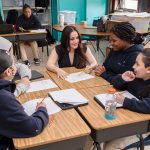 FAMILY  BUSINESS:  Michaela Andreozzi, center, comes from a family of ­educators and now teaches third and fourth grade math at ­Providence Prep. PBN PHOTO/TRACY JENKINS