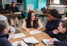 NEW MATH: R.I. helping finances add up for teachers FAMILY
BUSINESS:
Michaela Andreozzi, center, comes from a family of educators and now teaches third and fourth grade math at Providence Prep.
PBN PHOTO/TRACY JENKINS
