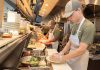 Recipe for success: Tyler Gill, foreground, splits his time between working at the J.T. Commons restaurant in Middletown with his classes at the Community College of Rhode Island.  PBN PHOTO/STEPHANIE BERNABA