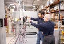 looking to the Future: Nate Fischer, left, director of product management at Taco Comfort Solutions, and John Forcino, vice president of operations, are helping mentor and grow the next generation of manufacturing leaders. PBN PHOTO/TRACY JENKINS