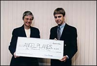 Elaine Roberts, executive director,<br> RIAC; and Matthew St. Peter, <br>CEO, Angel Planes, Inc. Elaine Roberts, executive director,<br> RIAC; and Matthew St. Peter, <br>CEO, Angel Planes, Inc.