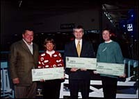 Richard Baccari, CEO of Churchill& Banks, presents donation. Richard Baccari, CEO of Churchill<br>& Banks, presents donation.