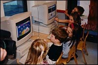 Children at GTECH's child carecenter enjoy the gift of newcomputers courtesy of Compaq. Children at GTECH's child care<br>center enjoy the gift of new<br>computers courtesy of Compaq.