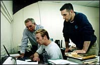 Professor Keith Moore with studentsMichael Sisson, seated, and MichaelWoronoff. (Tom Croke) Professor Keith Moore with students<br>Michael Sisson, seated, and Michael<br>Woronoff. (Tom Croke)