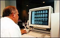Technician at work at the MRICenter in Cranston. (Tom Croke) Technician at work at the MRI<br>Center in Cranston. (Tom Croke)