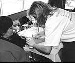 A Beacon employee takes part ina kidney screening. (Al Alexio)