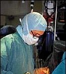 Surgeon at workconcentrates intensely.(PBN file photo)