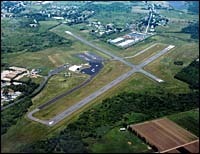 At Newport Airport repairs areplanned for hangar in center,along with other work. At Newport Airport repairs are<br>planned for hangar in center,<br>along with other work.