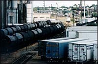 Tank cars and trucks waiting tobe loaded or unloaded offSmithfield Avenue. (Tom Croke) Tank cars and trucks waiting to<br>be loaded or unloaded off<br>Smithfield Avenue. (Tom Croke)