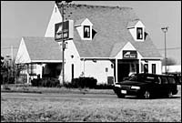 Business as usual at FleetBostonbranch despite dropoff incorporate earnings. (Tom Croke) Business as usual at FleetBoston<br>branch despite dropoff in<br>corporate earnings. (Tom Croke)