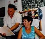 Reviewing plans for the nextcompany outing are Pat Borelli andKaren Eastman. (Al Alexio)