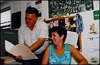 Reviewing plans for the nextcompany outing are Pat Borelli andKaren Eastman. (Al Alexio) Reviewing plans for the next<br>company outing are Pat Borelli and<br>Karen Eastman. (Al Alexio)