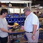 Finally, a break in electricity rates Young Jin, left, and Tom Magnettereview a framing nailerat Stanley Fasteners