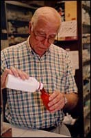 URI pharmacy grads in demand; supply is short John DePasquale of DePasquale's Pharmacyfills a prescription(Brian McDonald)