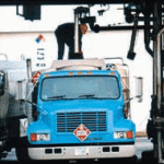 Oil dealers feel pinch of warmth, falling prices FILLING UP at East Providence Fuel Company.