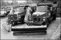 Snow plows sit idle at LawnBeauticians in Cranston. Snow plows sit idle at Lawn<br>Beauticians in Cranston.