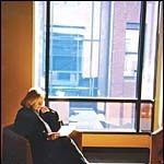 Laura Freid enjoys a quiet moment at the headquartersof Brown's new Englishdepartment.