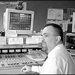 Despite growth pressures, radio stations focus on local market COOL 102 DJ Randy Clemens exerciseshis indpendence on the airwaves.