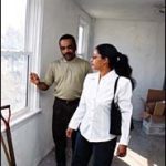 Clara Galvan tours a prospectivehome with Tomas Avila of DeWolfeRealtors.