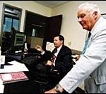 <b>Bears rule and investors scramble</b><br><i>401(k) owners struggle to limit their losses</i> Brokers at Providence office ofAdvest, Inc.
