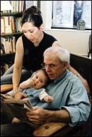 Robert Leaver and his wife Michelle Gonzalezsearch the classifieds. Robert Leaver and his <br>wife Michelle Gonzalez<br>search the classifieds.