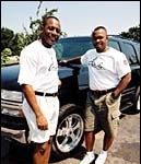 One of the Davin Wheel Co. owners, Hank Seemore,  right, with Wayne Procope, comptroller