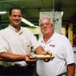 Their safety valve could save you plenty WAGS, a water and gas safety valve, is held byPaul Almberg, co-inventor with Clyde Bargwanath.