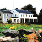 City dwellers seek solace in the seaside towns Land and sea are dear along Massachusetts'southeastern shoreline.