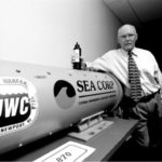 SEA Corp. winners in contracts and developments SEA Corp. president Brian Gilligan holds a cartridge used in launchingtorpedoes or auto airbags.