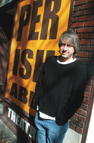 Mark Lerman enjoys the afternoonsunshine on Empire Street. Mark Lerman enjoys the afternoon<br>sunshine on Empire Street.