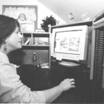 Web link connects parents and day care Observing her child through a Cranston day carecenter's Web site is Deborah B. Epstein.