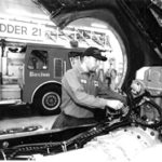Firm fills niche in fire, emergency vehicle market At Greenwood Fire Apparatus in North Attleboro,Mark Sullivan works on a brand new pumper.